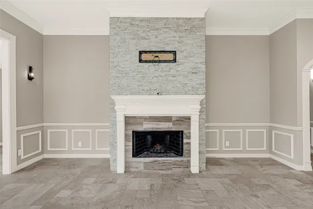 an empty room with fireplace