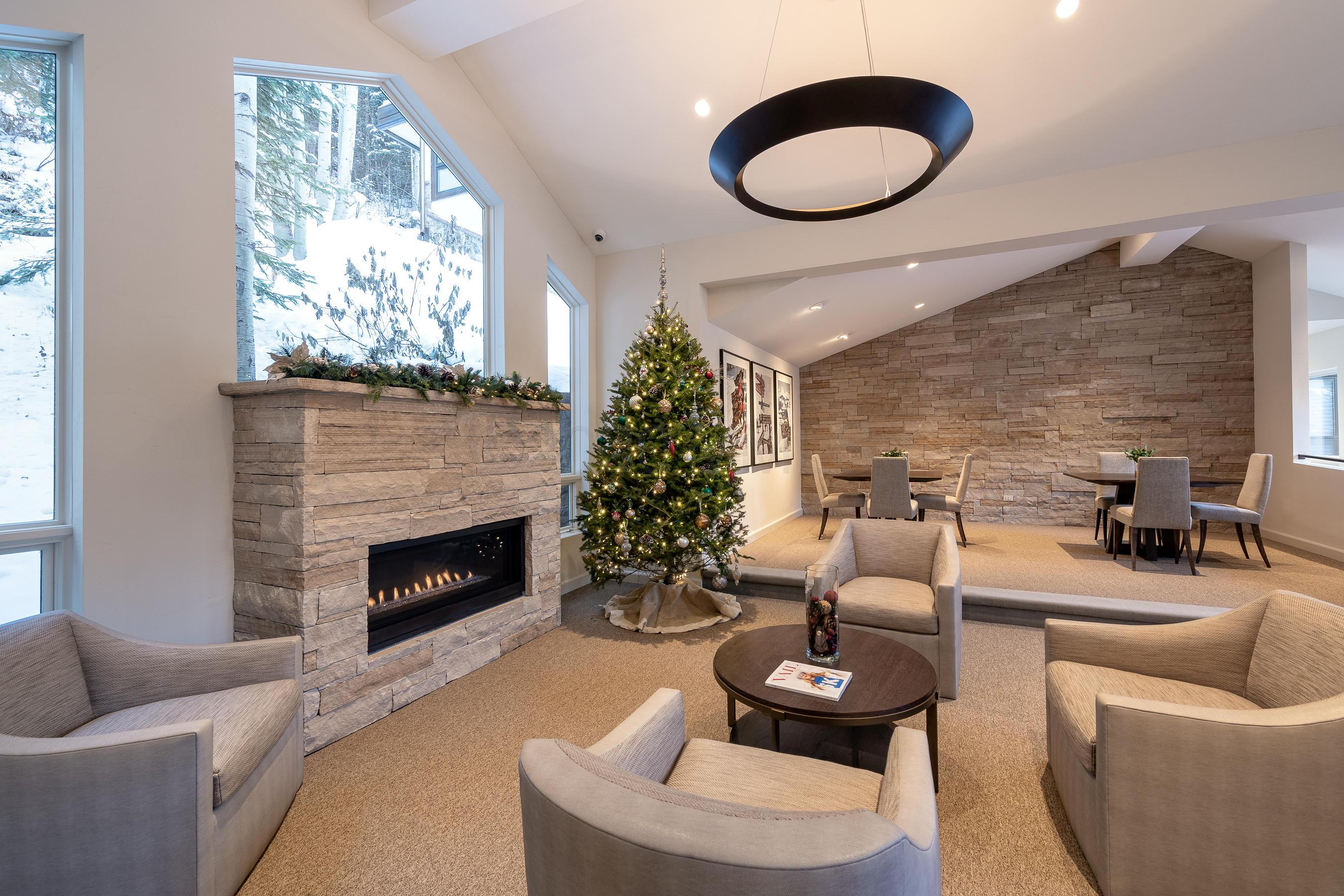 600 Vail Valley Drive, Unit E 9 Vail, CO 81657 - Photo 19 of 26 a living room with furniture fireplace and window