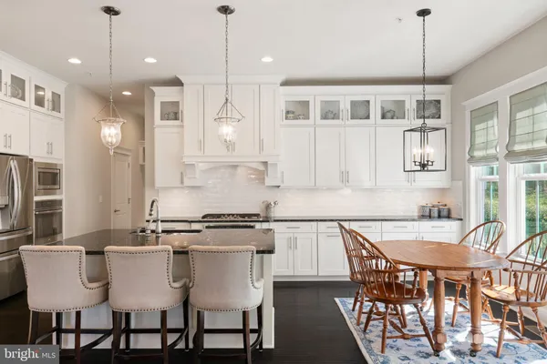 a view of road with large trees
