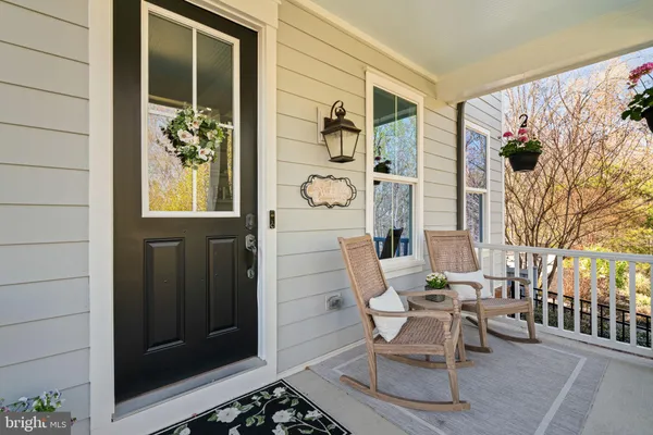 a view of a backyard with swimming pool