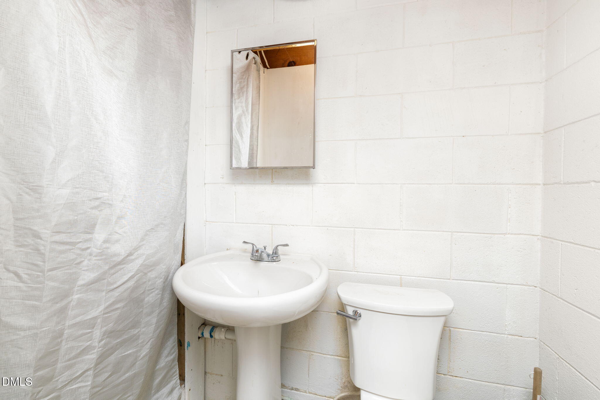 2732 Nutbush Road Henderson, NC 27537 - Photo 20 of 37 Downstairs Bathrooom