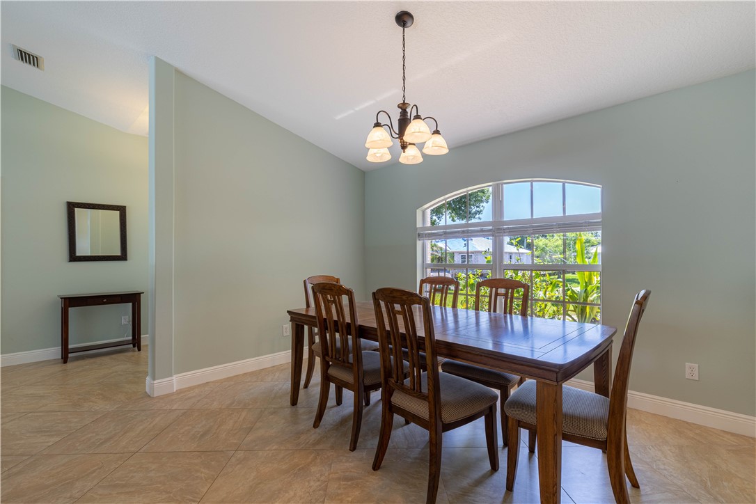 414 Ash Street Sebastian, FL 32958 - Photo 13 of 36 a view of a dining room with furniture window and outside view