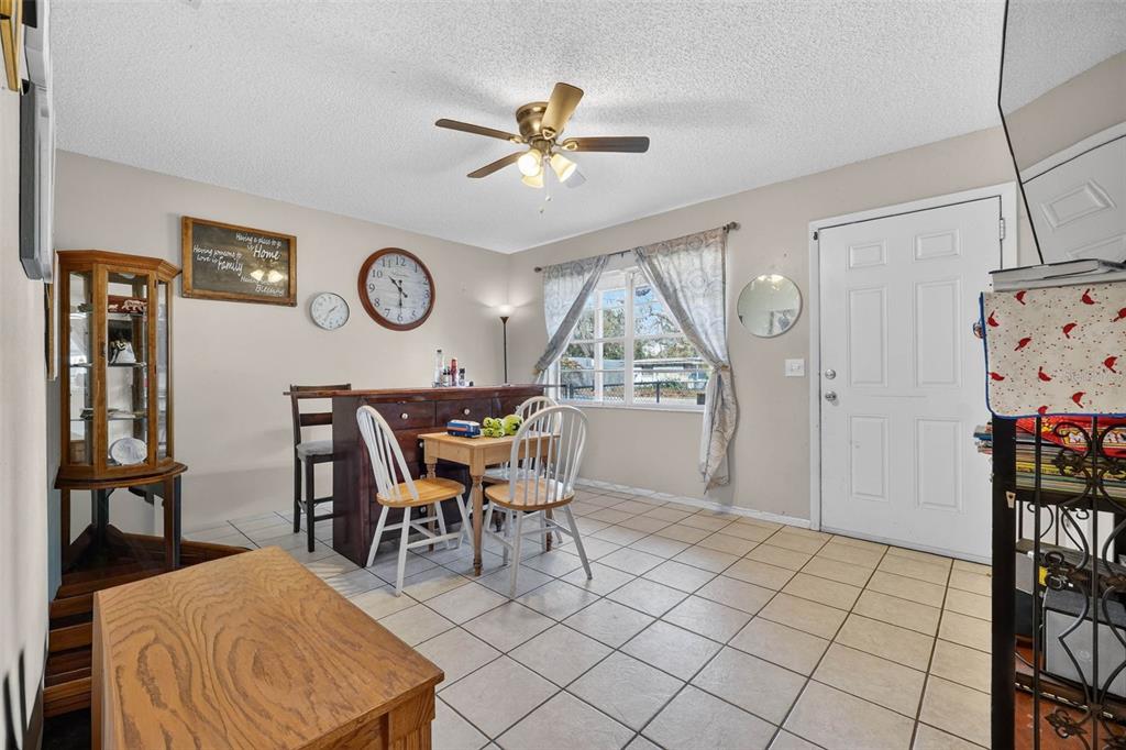 2613 Fowler Avenue Auburndale, FL 33823 - Photo 14 of 61 a view of a livingroom and a dining table & chairs