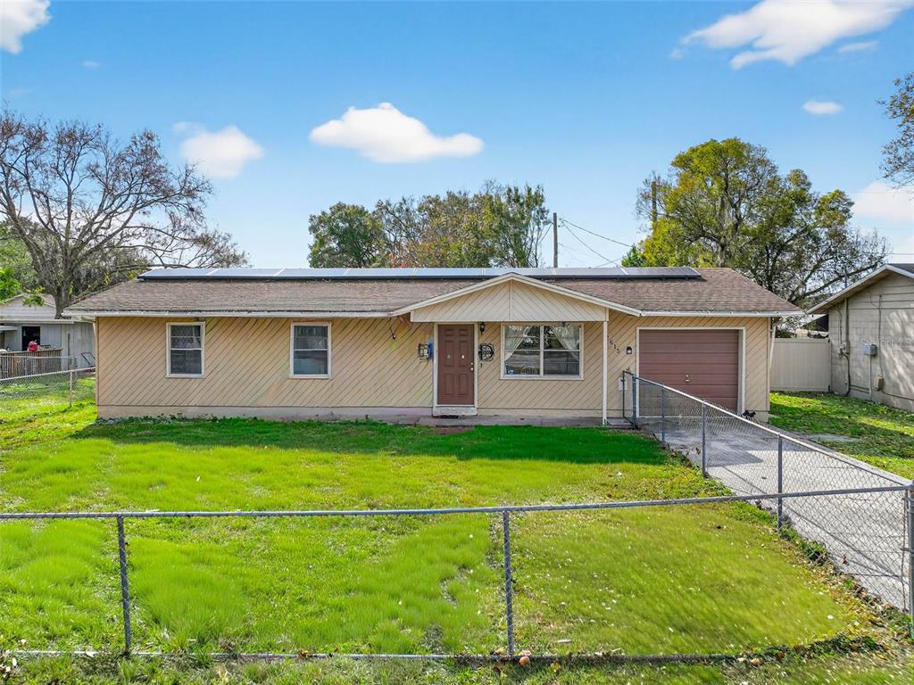 2613 Fowler Avenue Auburndale, FL 33823 - Photo 2 of 61 a view of a house with a yard