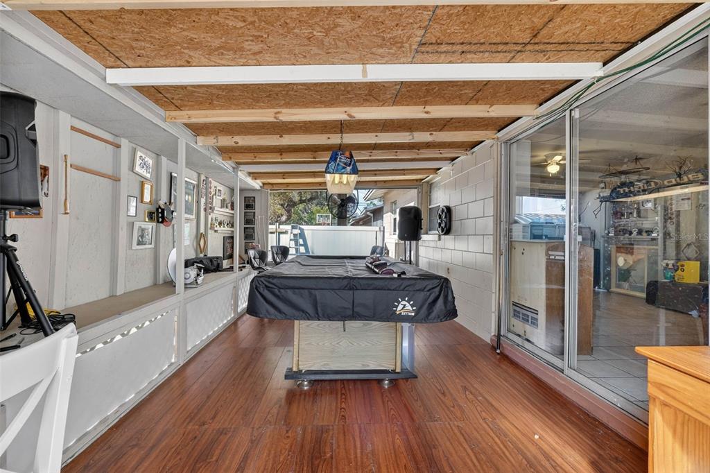 2613 Fowler Avenue Auburndale, FL 33823 - Photo 36 of 61 a living room with furniture and a wooden floor