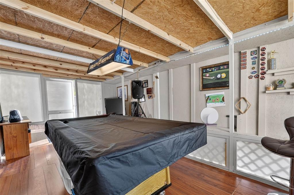 2613 Fowler Avenue Auburndale, FL 33823 - Photo 37 of 61 a living room with a bed and a table