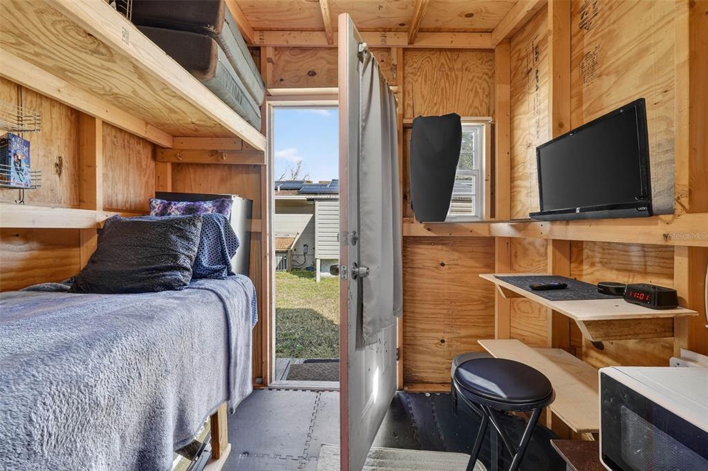 2613 Fowler Avenue Auburndale, FL 33823 - Photo 48 of 61 a view of a livingroom with furniture and a flat screen tv