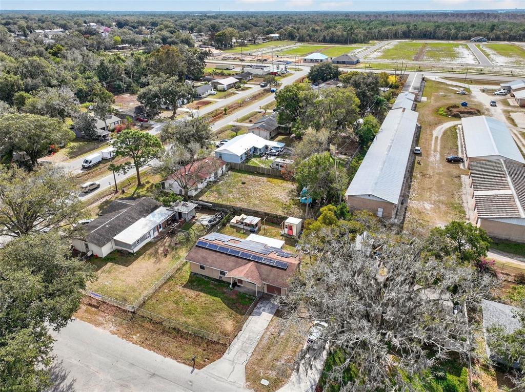 2613 Fowler Avenue Auburndale, FL 33823 - Photo 57 of 61 an aerial view of residential houses with outdoor space and river