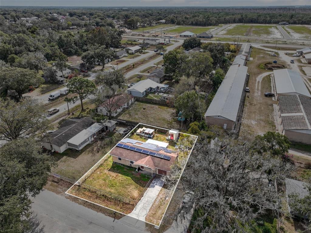 2613 Fowler Avenue Auburndale, FL 33823 - Photo 58 of 61 an aerial view of a house with a lake view