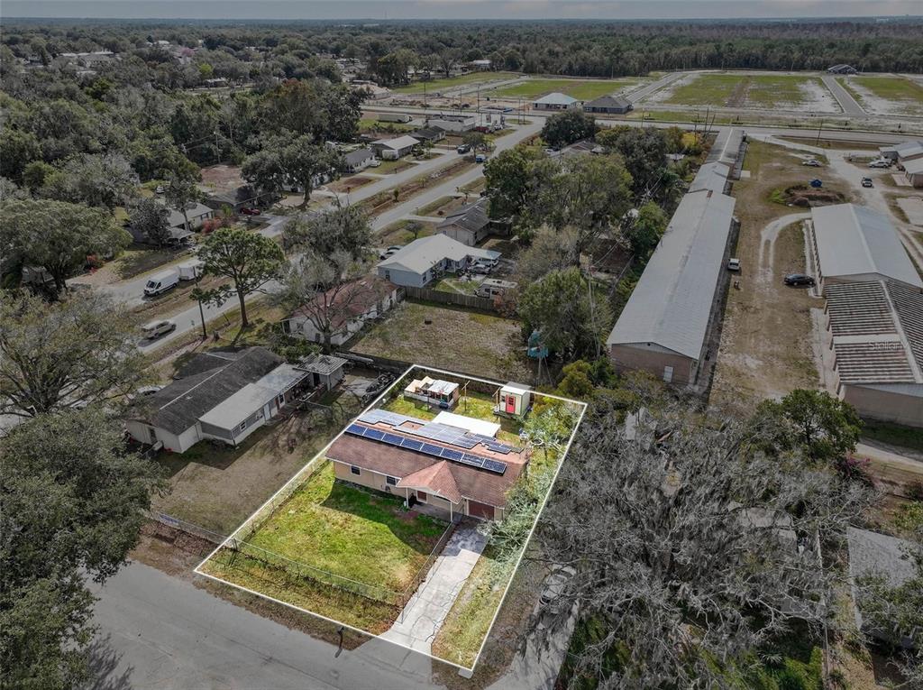 2613 Fowler Avenue Auburndale, FL 33823 - Photo 59 of 61 an aerial view of residential house with outdoor space and lake view