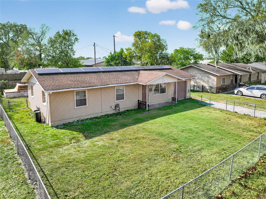 2613 Fowler Avenue Auburndale, FL 33823 - Photo 7 of 61 a view of a house with backyard and garden