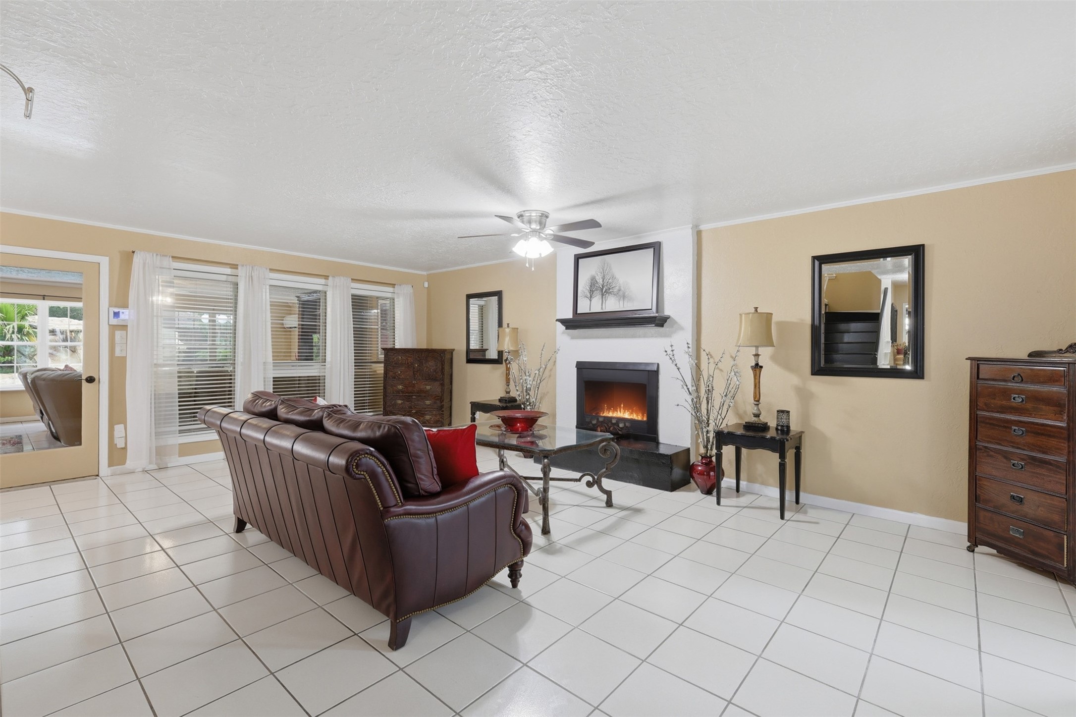 7010 River Mill Drive Spring, TX 77379 - Photo 7 of 29 a living room with furniture and a fireplace