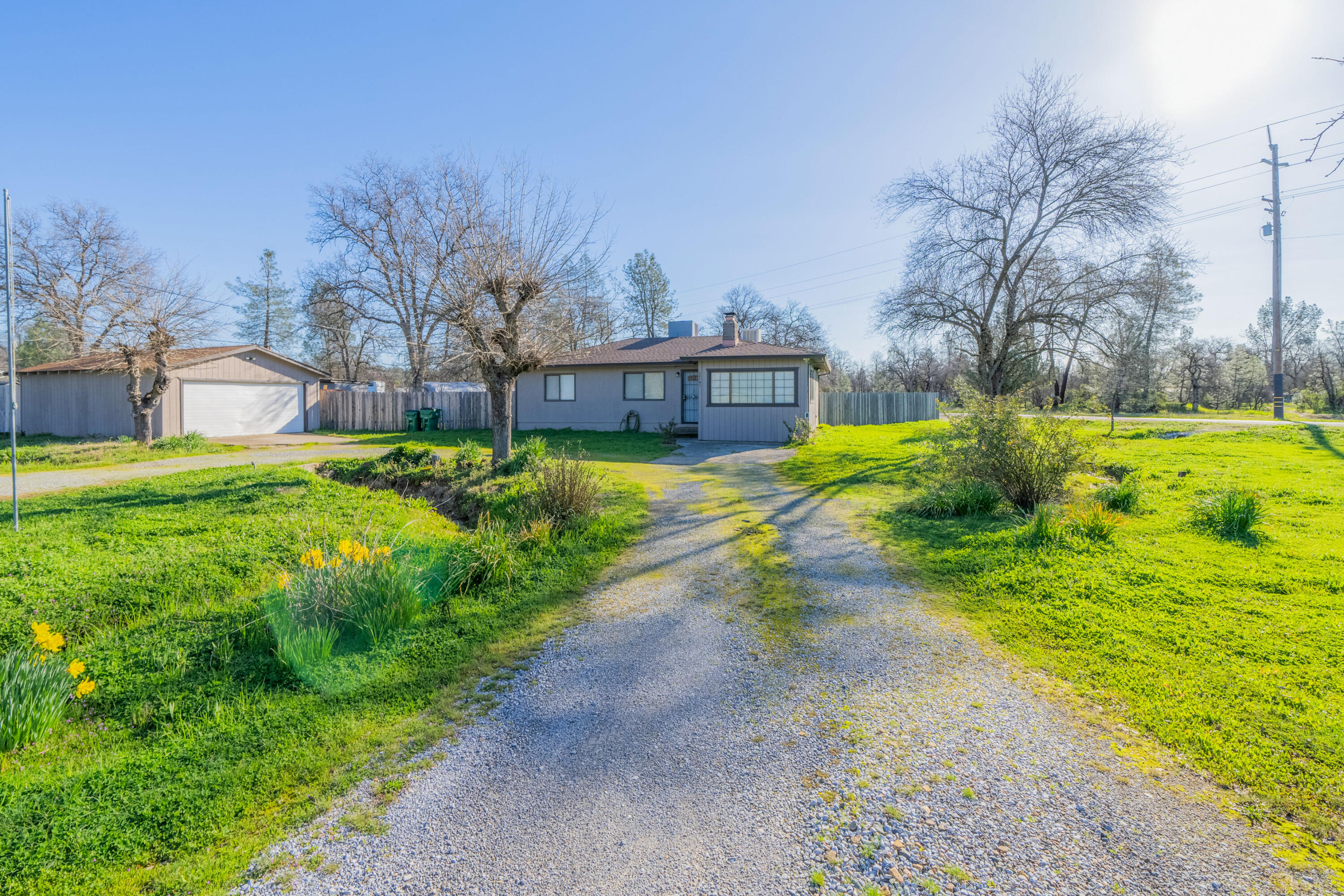 12161 Randolph Road Redding, CA 96003 - Photo 2 of 37 a view of a house with pool and a yard
