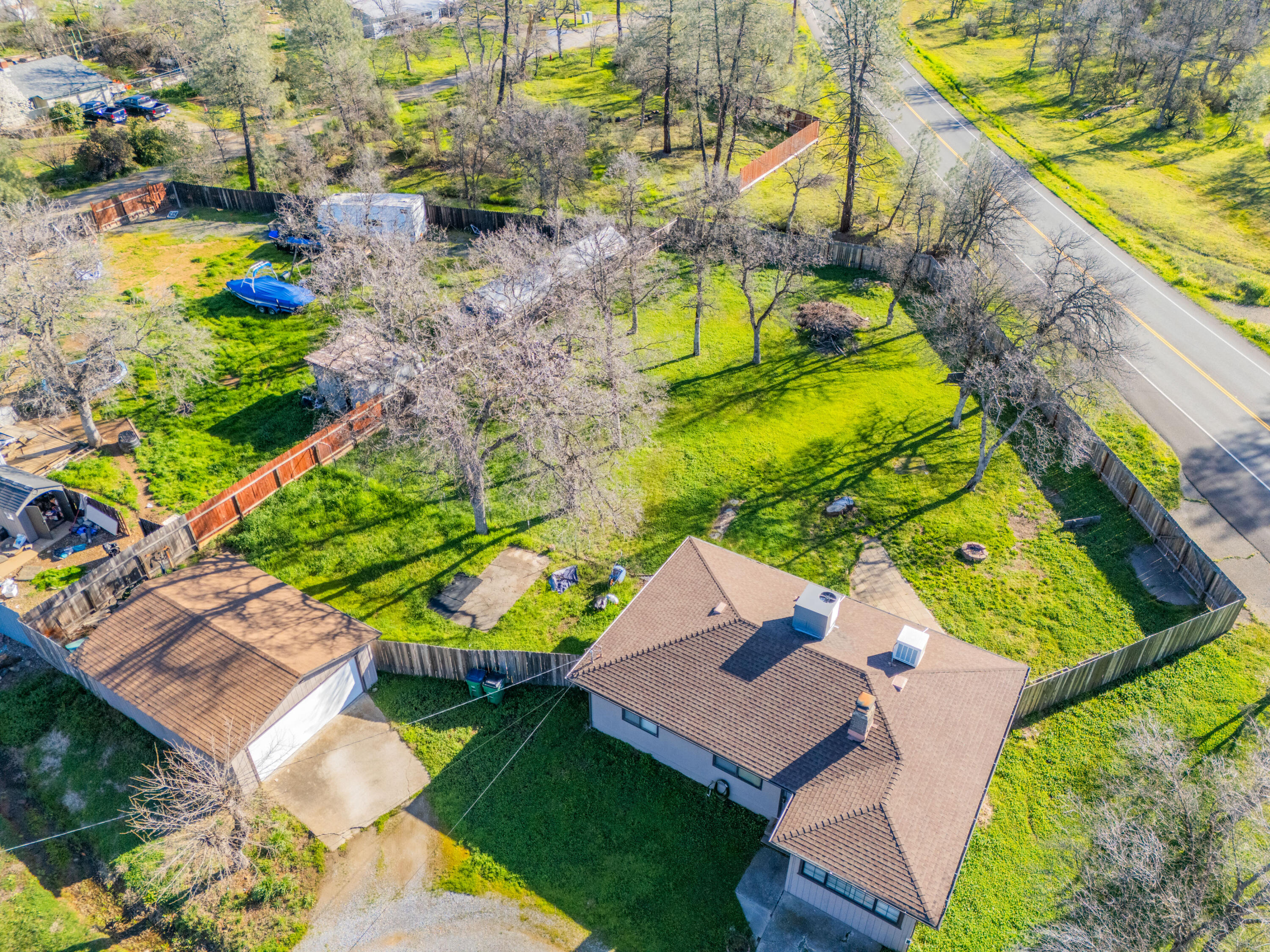 12161 Randolph Road Redding, CA 96003 - Photo 29 of 37 an aerial view of a house with a swimming pool