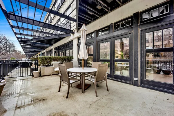 a dining room with furniture water heater and a bathtub