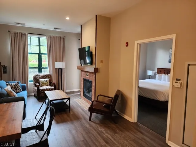 a workspace with furniture and a window