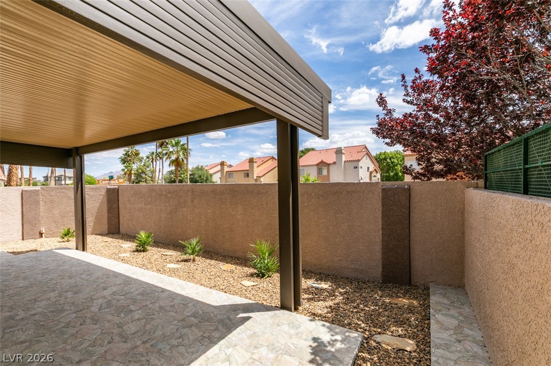 540 Sutters Mill Road Henderson, NV 89014 - Photo 5 of 46 An inviting outdoor area with a covered patio, perfect for relaxing.