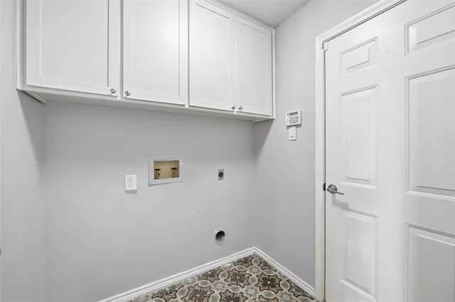 a view of cabinets and wooden floor