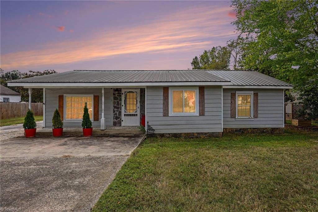5883 Mendenhall Road Archdale, NC 27263 - Photo 27 of 28 Front at Twilight