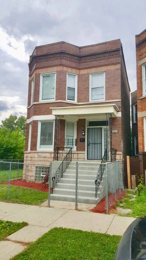 5708 South Aberdeen Street Chicago, IL 60621 - Photo 2 of 25 a front view of a house