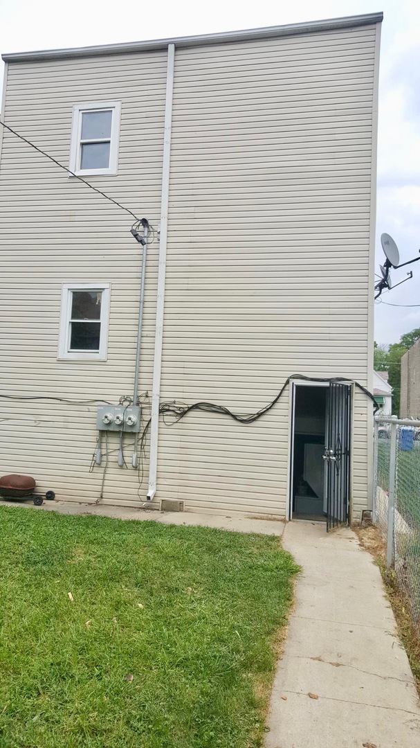 5708 South Aberdeen Street Chicago, IL 60621 - Photo 24 of 25 a view of front door and a yard