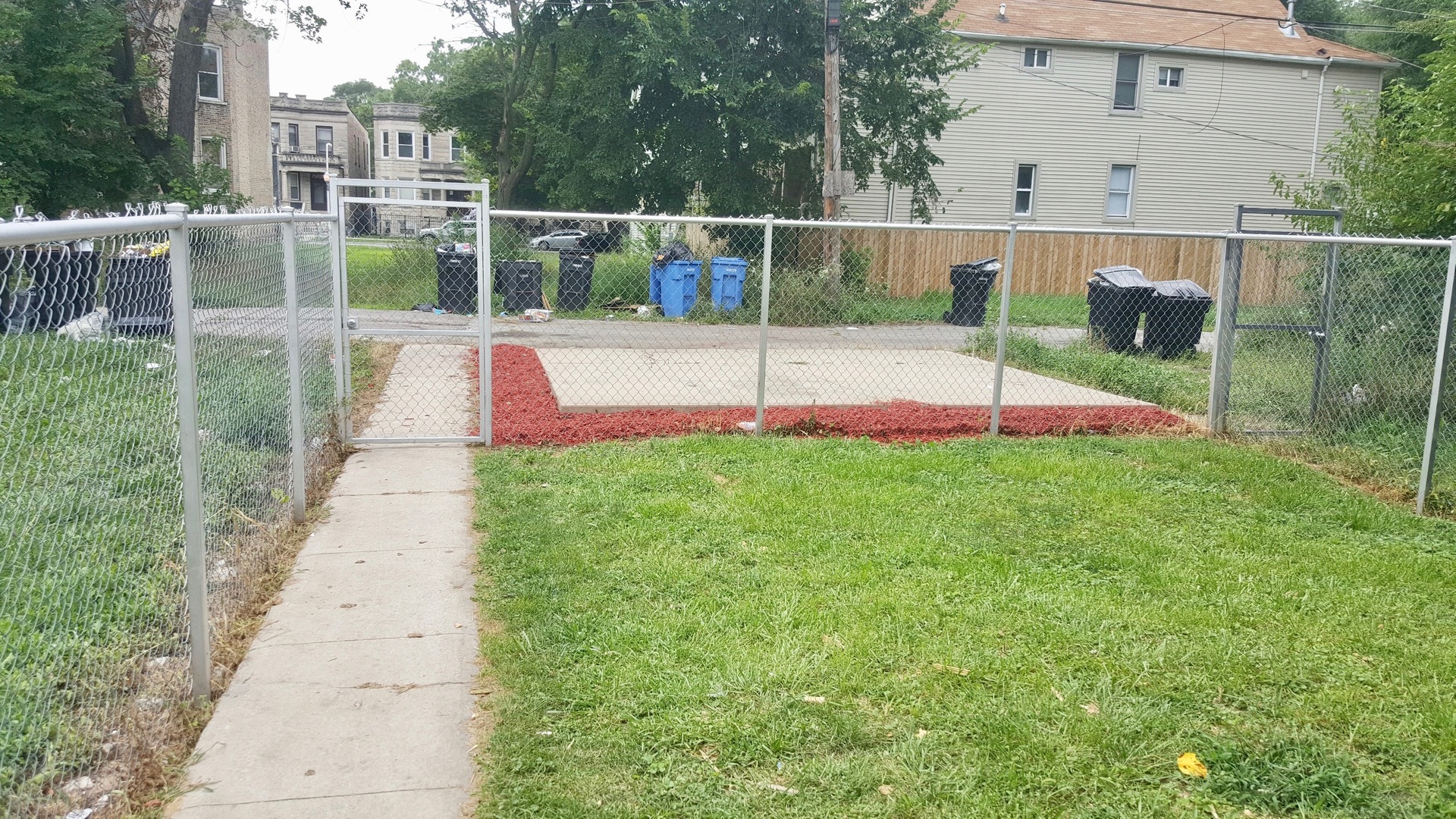 5708 South Aberdeen Street Chicago, IL 60621 - Photo 25 of 25 a view of a deck with a small yard