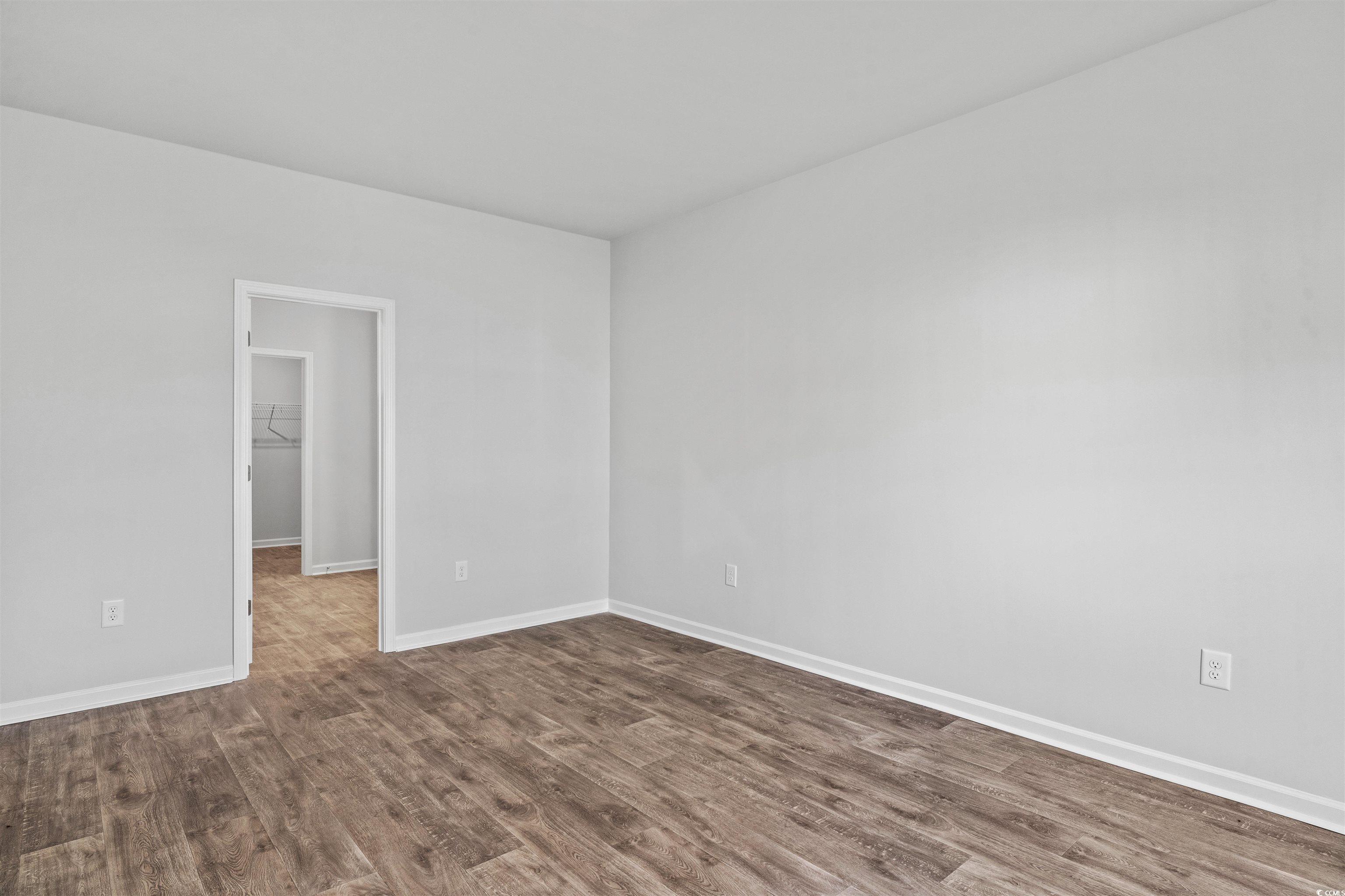 419 Ribbon Rail Way Loris, SC 29569 - Photo 18 of 32 Spare room with hardwood / wood-style floors