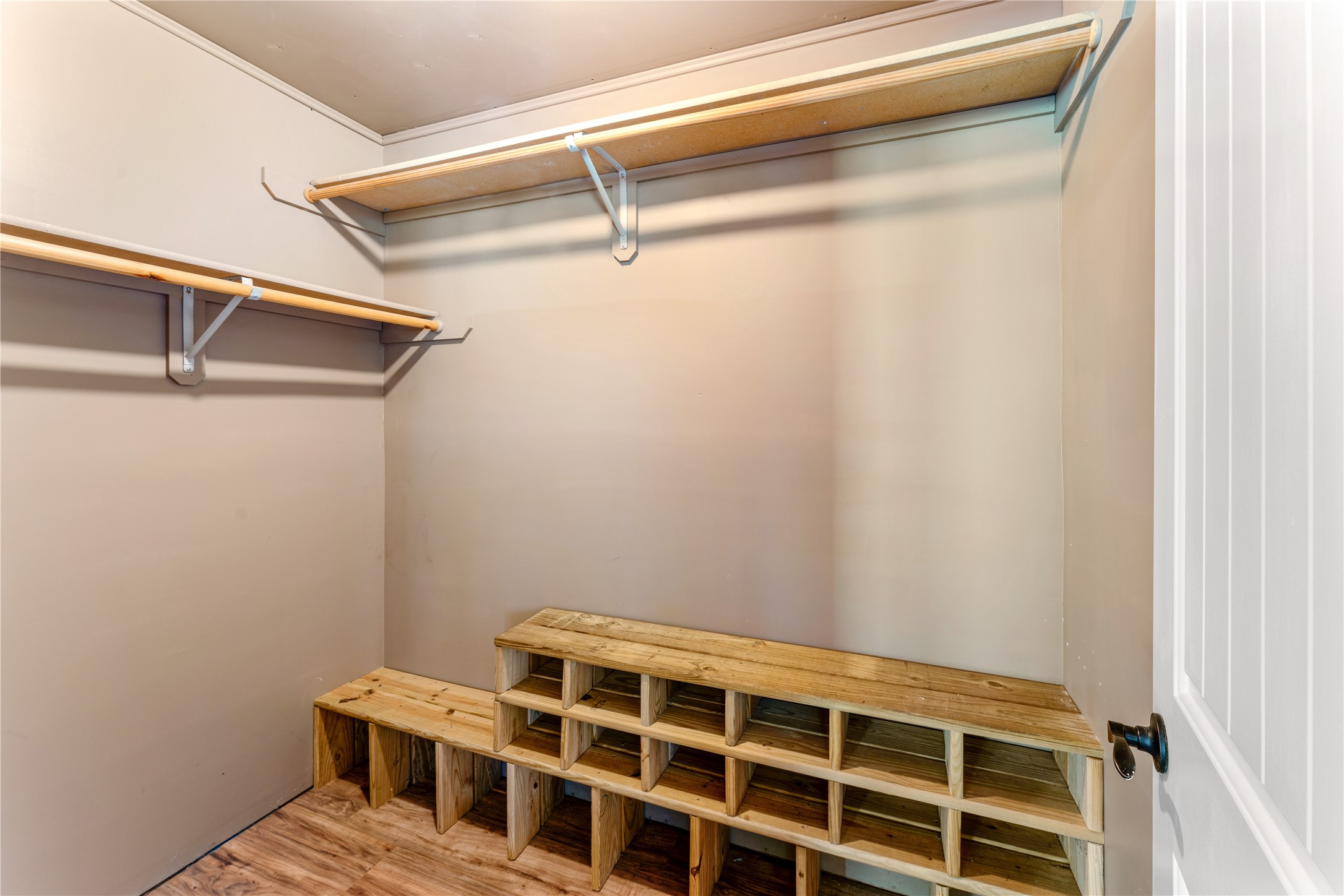 36610 Lariat Lane Simonton, TX 77485 - Photo 35 of 43 a view of walk in closet with empty racks