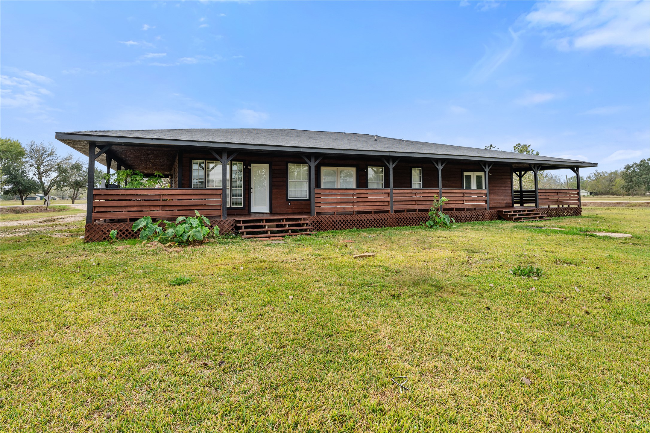 36610 Lariat Lane Simonton, TX 77485 - Photo 8 of 43 a view of a house with a yard