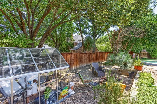 an outdoor space with garden