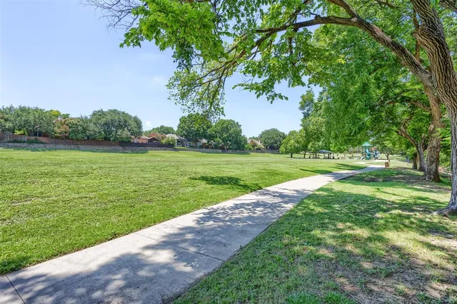 a view of a golf course with a garden