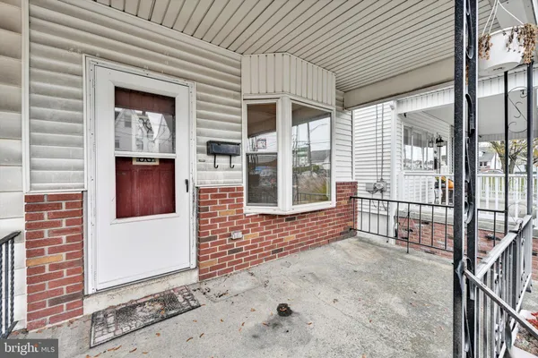 a view of a porch of a house