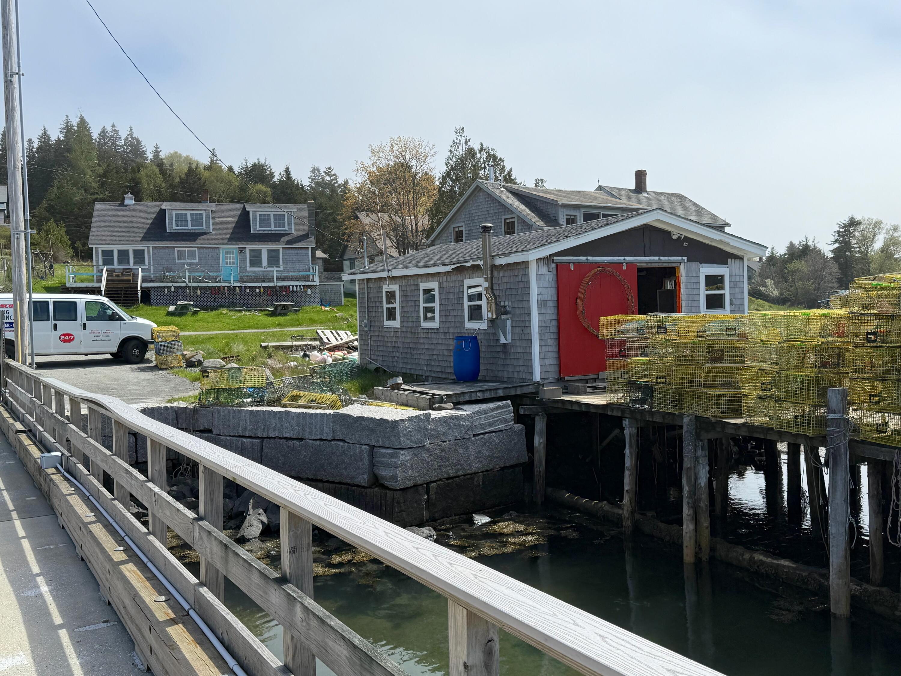 65 East Shore Road Frenchboro, ME 04635 - Photo 1 of 52 shop and house from town wharf