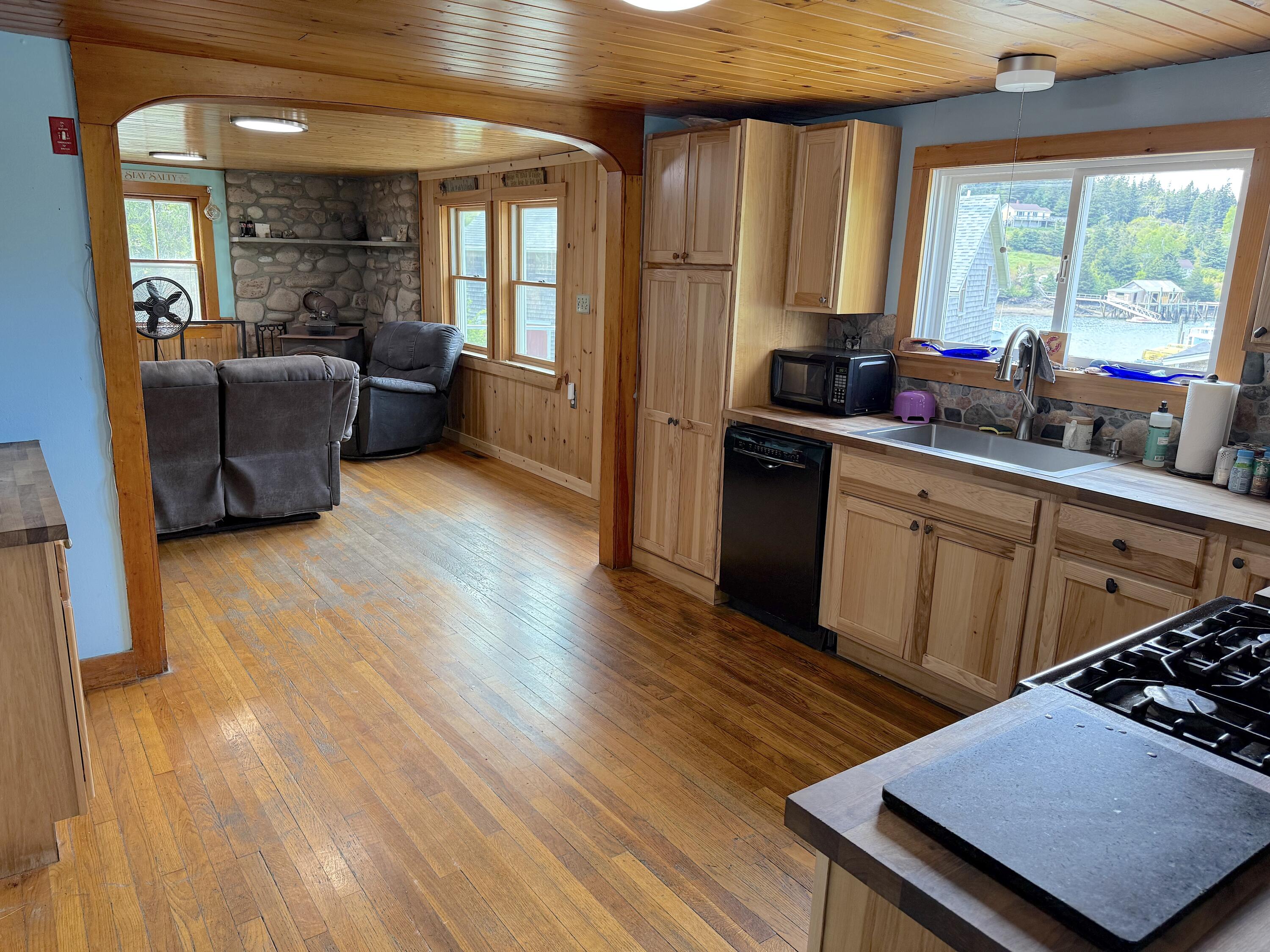 65 East Shore Road Frenchboro, ME 04635 - Photo 19 of 52 kitchen to living