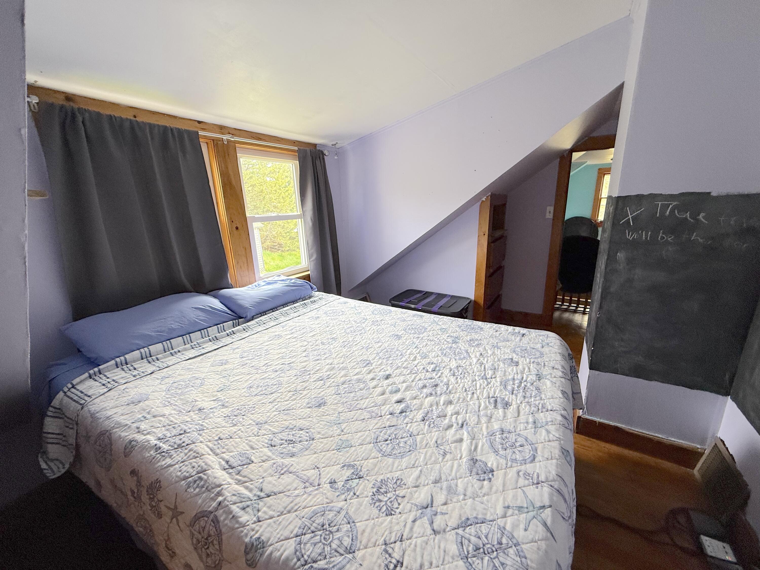 65 East Shore Road Frenchboro, ME 04635 - Photo 29 of 52 purple bed 3