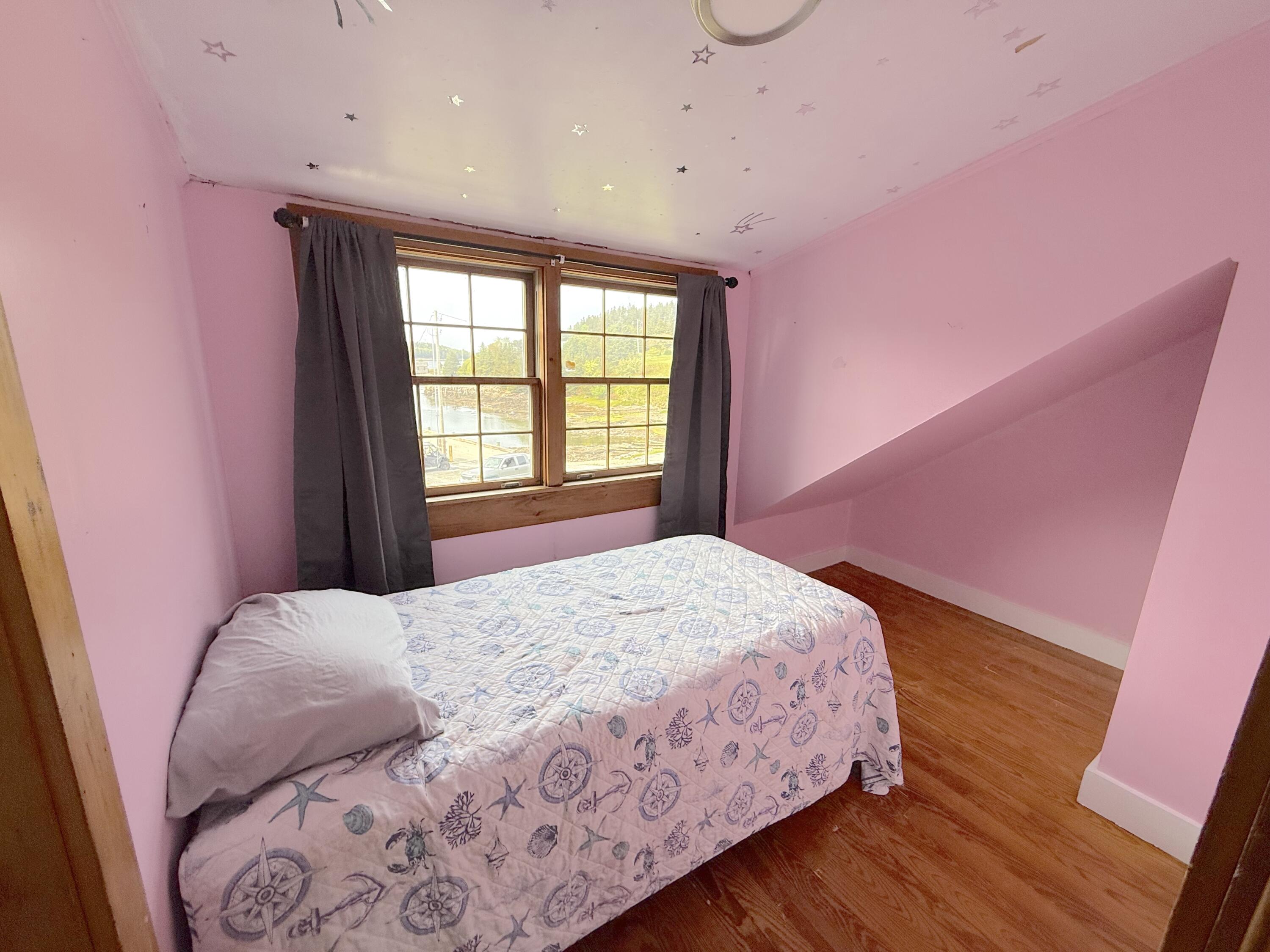 65 East Shore Road Frenchboro, ME 04635 - Photo 30 of 52 pink bed