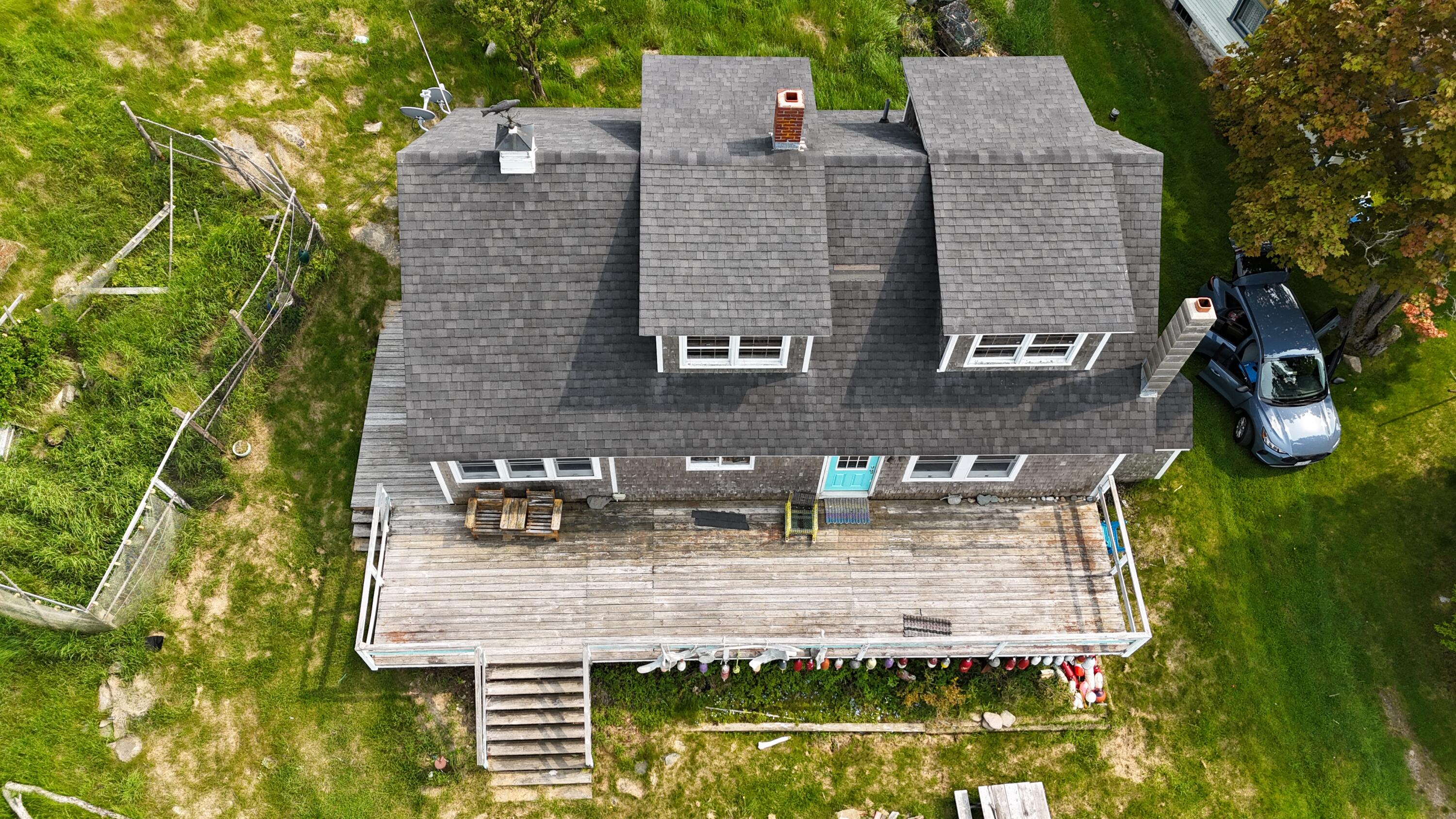 65 East Shore Road Frenchboro, ME 04635 - Photo 6 of 52 looking down front porch