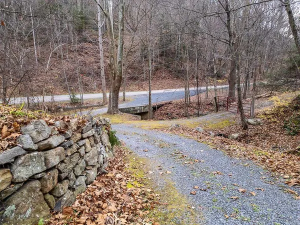 a view of balcony and yard