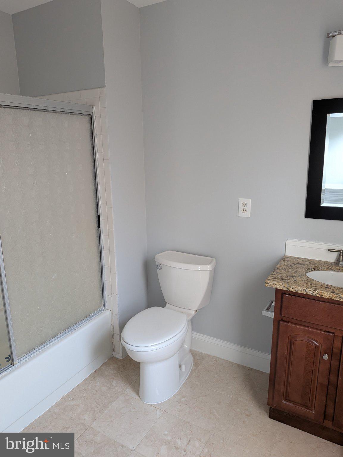 1516 Coat Ridge Road Herndon, VA 20170 - Photo 7 of 20 Modern bathroom with sleek finishes.
