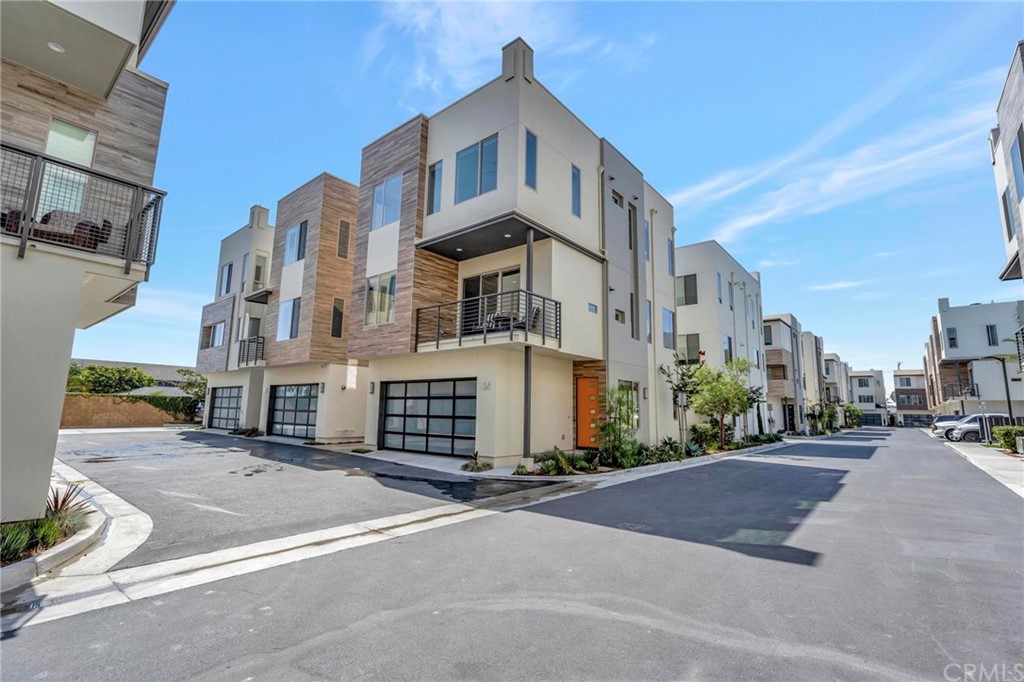 a front view of a building with a street