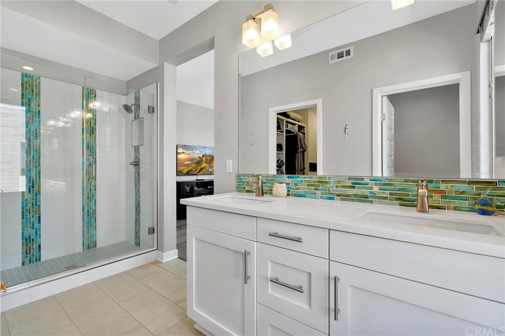 57 Ebb Tide Circle Newport Beach, CA 92663 - Photo 7 of 12 a bathroom with a sink and a mirror