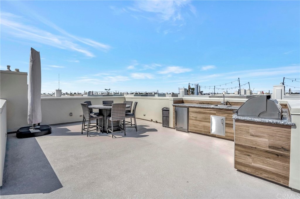 57 Ebb Tide Circle Newport Beach, CA 92663 - Photo 9 of 12 a view of a terrace with chairs