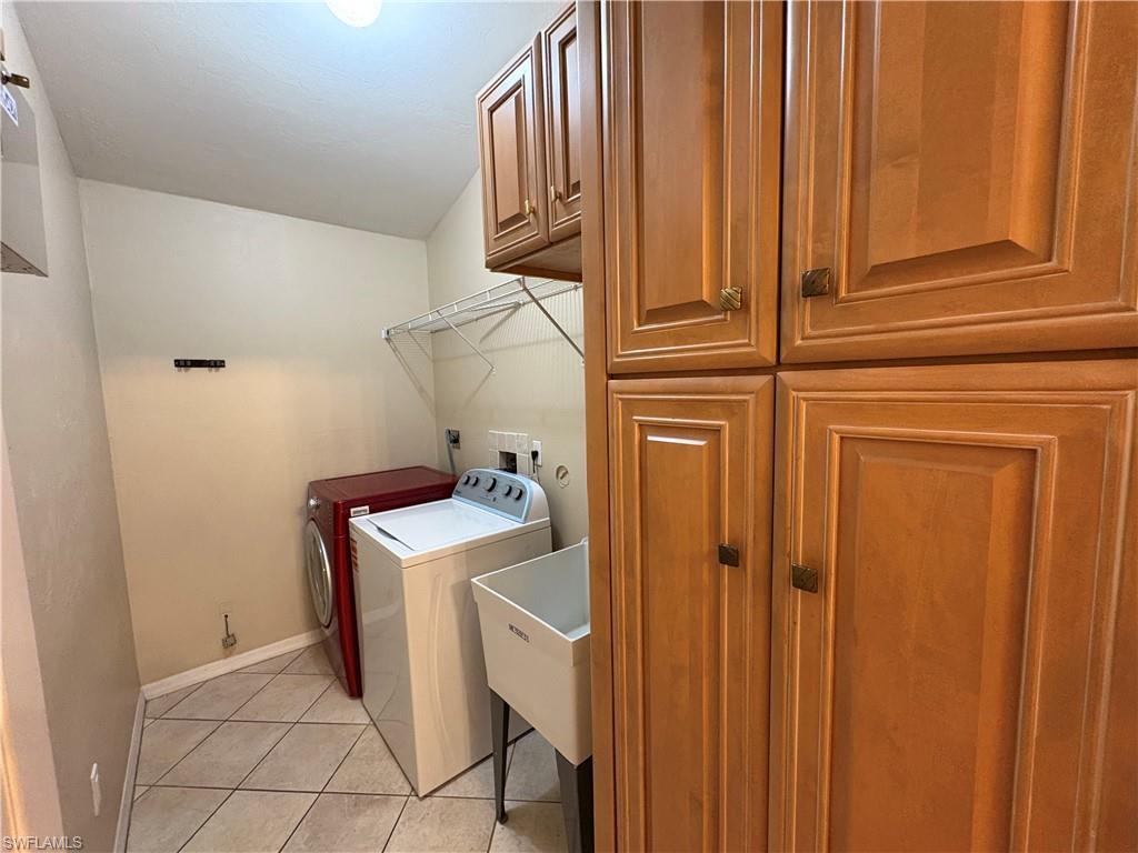 5232 Raintree Lane Naples, FL 34113 - Photo 27 of 38 MOP SINK & CUSTOM PANTRY STORAGE