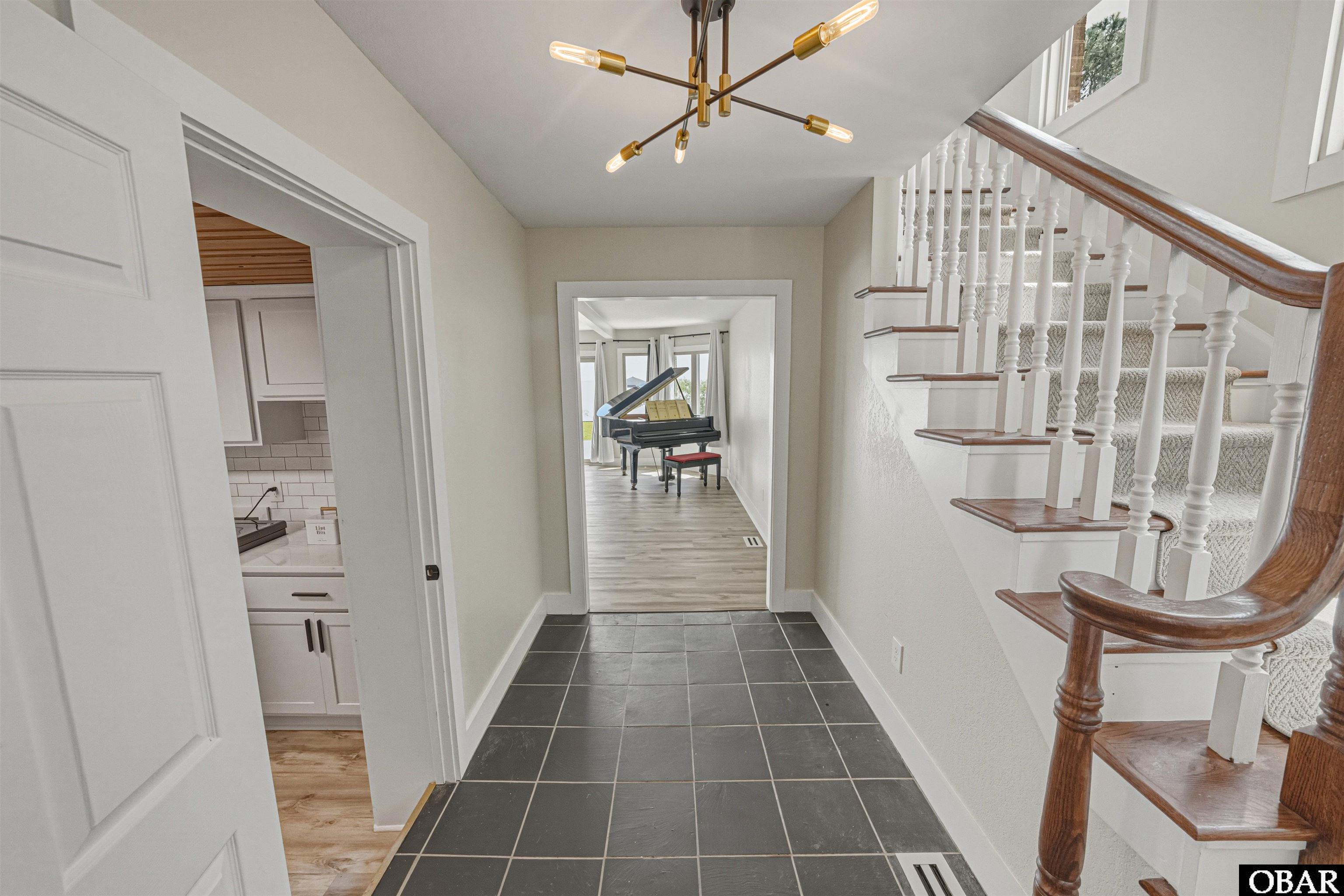 932 Waterlily Road Coinjock, NC 27923 - Photo 6 of 86 New Light Fixtures Throughout