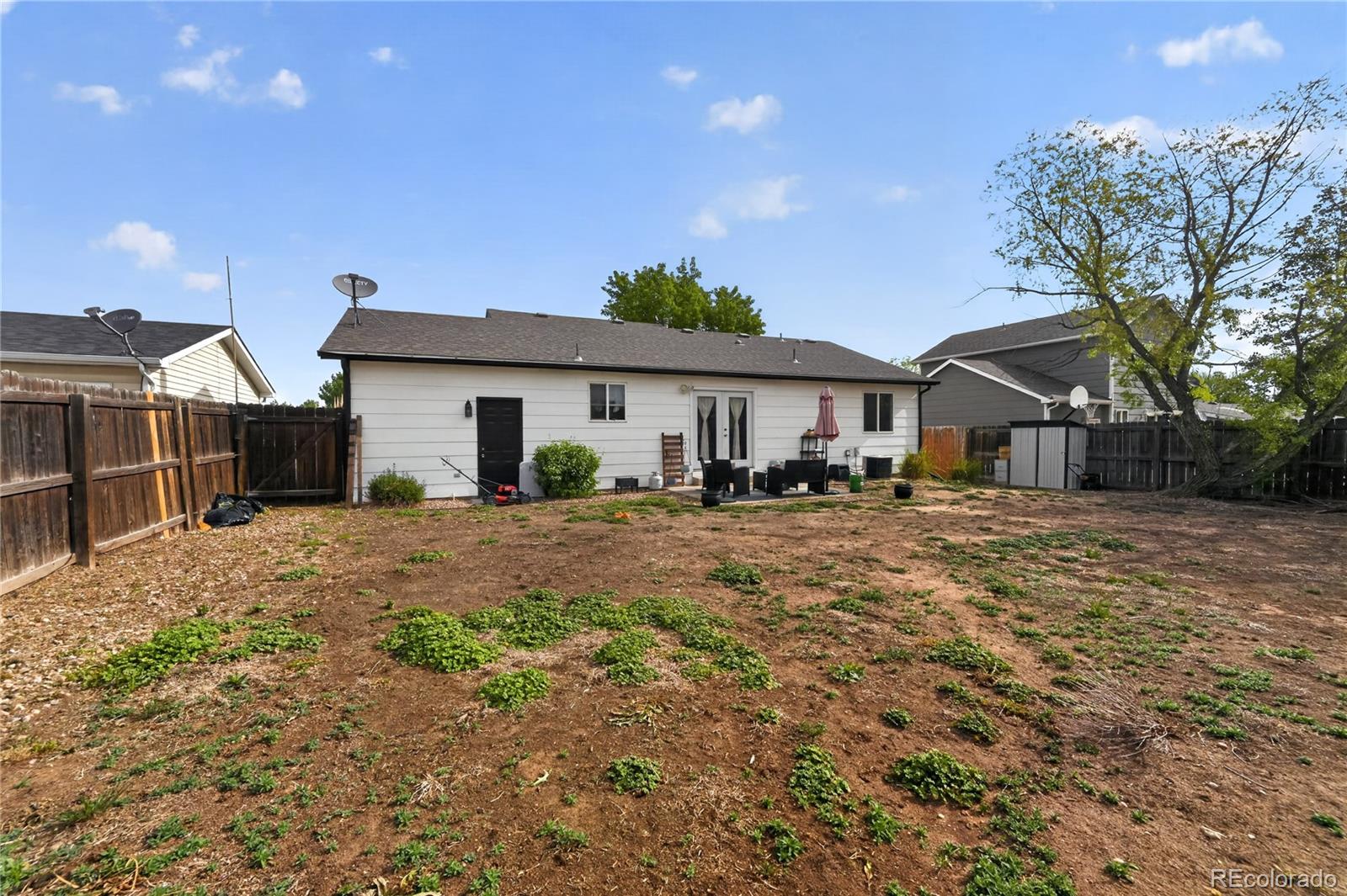 3170 West 3rd Street Road Greeley, CO 80631 - Photo 29 of 29 a front view of a house with garden