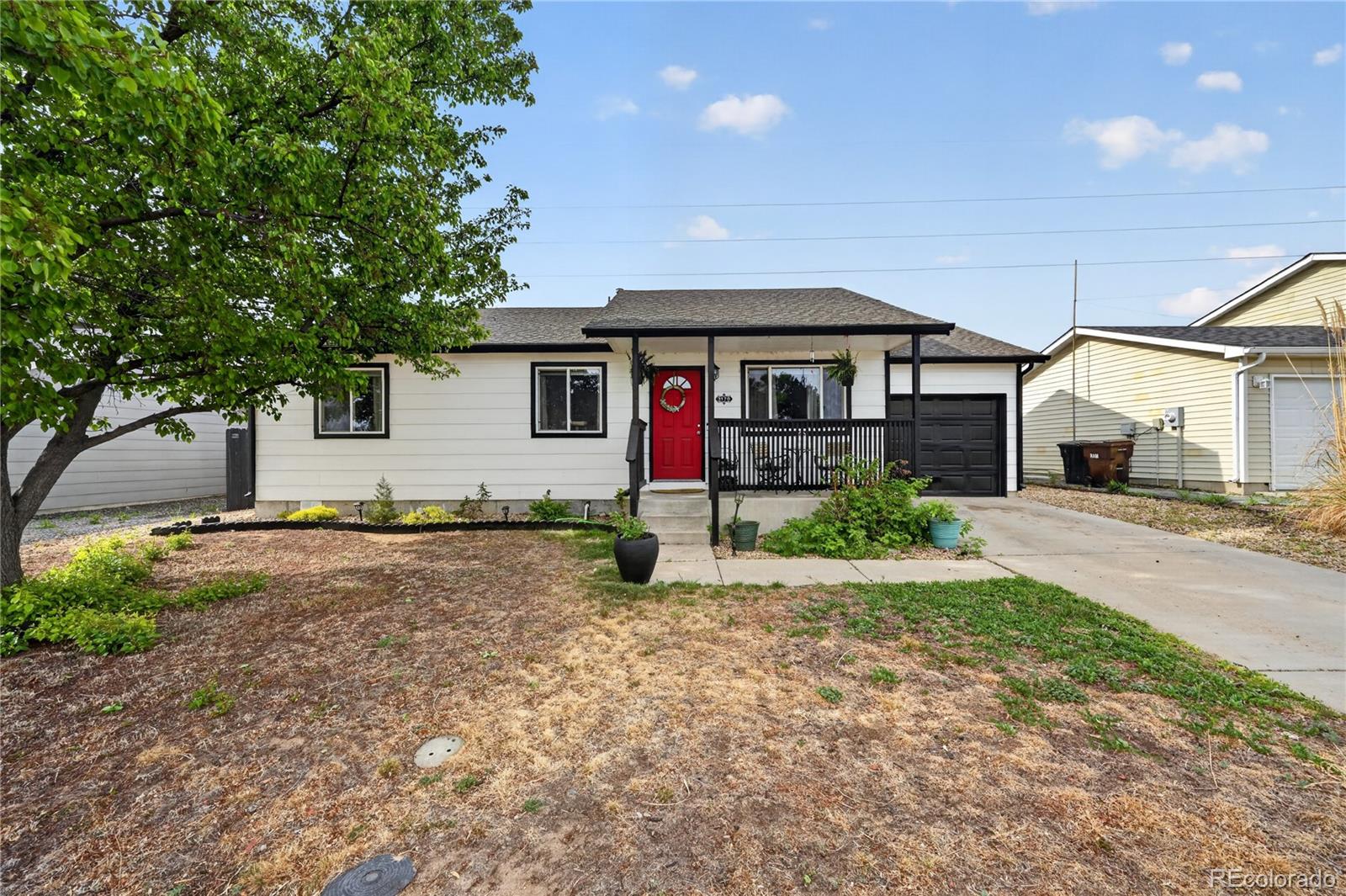 3170 West 3rd Street Road Greeley, CO 80631 - Photo 4 of 29 front view of a house with a yard