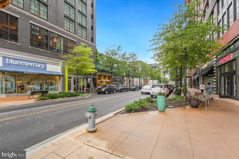 a view of a building with sitting area