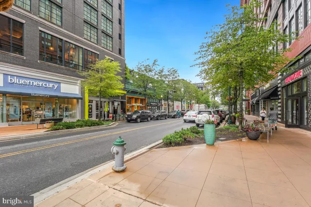 a view of a building with sitting area