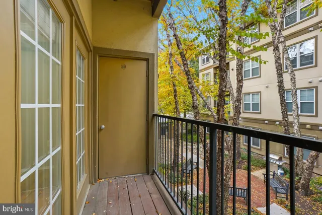 a view of balcony with wooden floor and wall