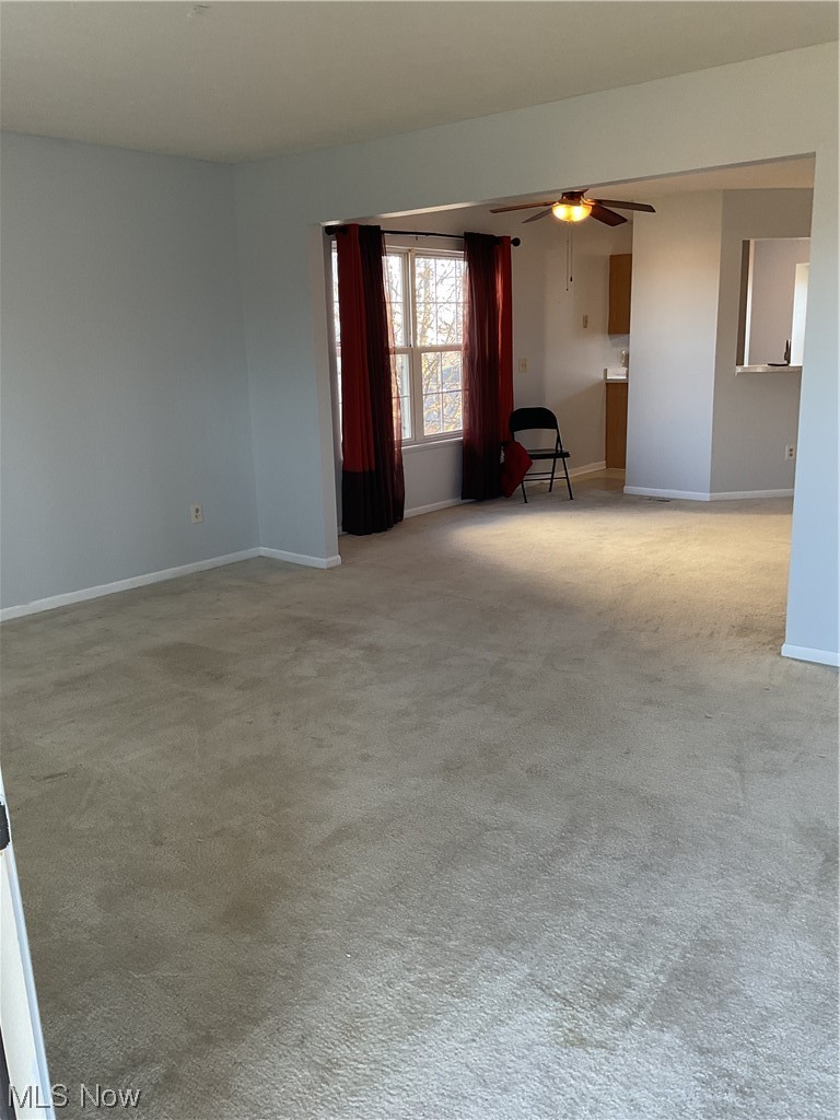 4422 Sexton Road Cleveland, OH 44105 - Photo 6 of 30 Carpeted spare room with ceiling fan